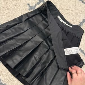 abercrombie and fitch black leather skirt, size small, in perfect condition!
